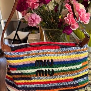 SOLDVibrant Striped Crochet Shoulder Bag